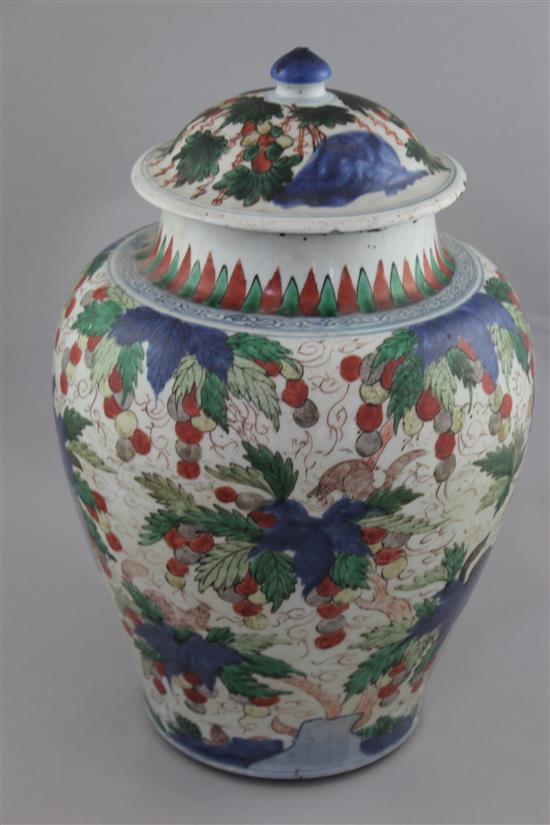 A Chinese wucai ovoid jar and cover, late 17th century, 37.5cm